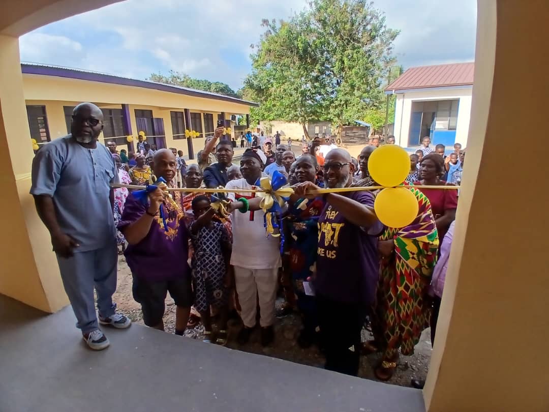 Ribbon cutting for the new classroom block at Kuntenase Presby JHS